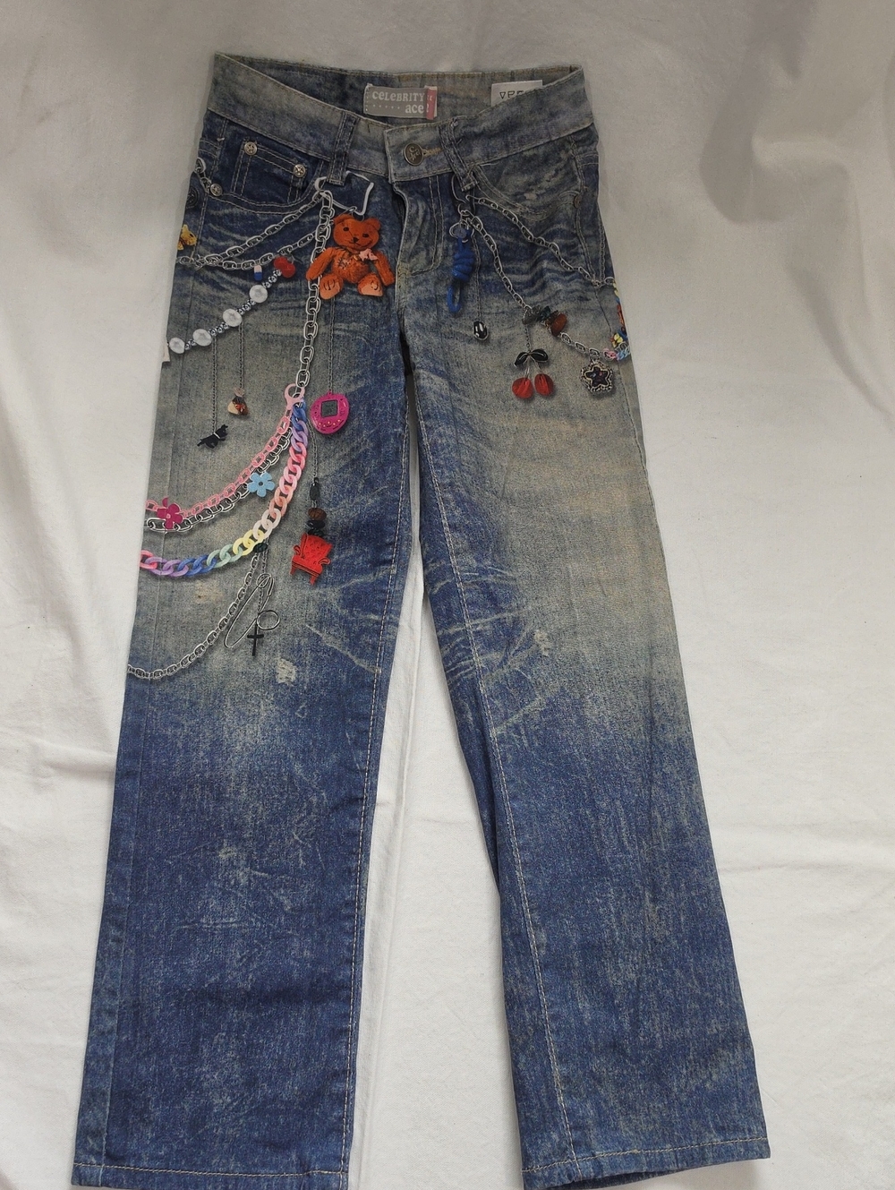 Celebrity Pink Distressed Blue Jeans with Charm Chains